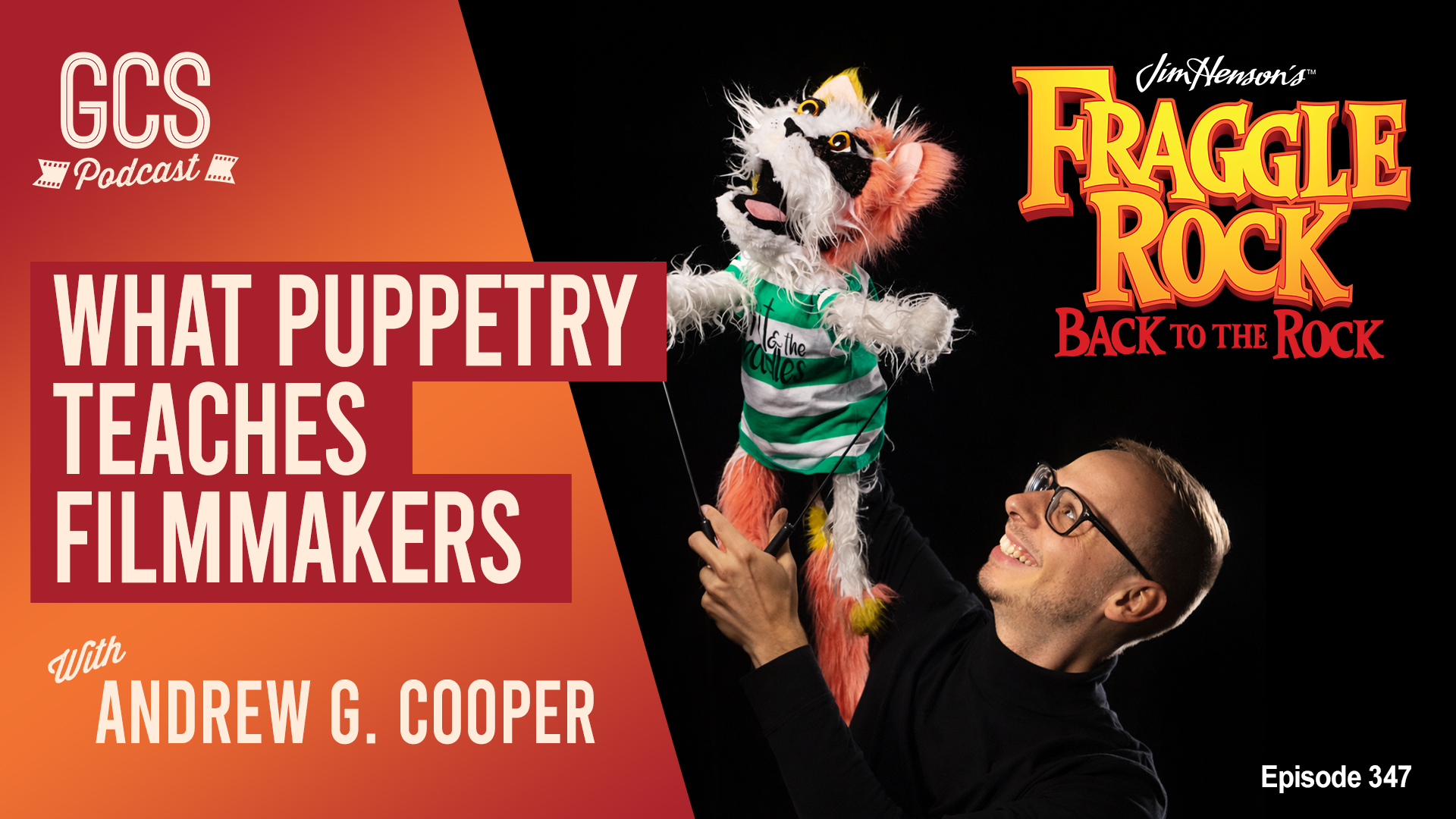 Andrew G. Cooper performing a puppet against a black background during a Go Creative Show podcast photo shoot.